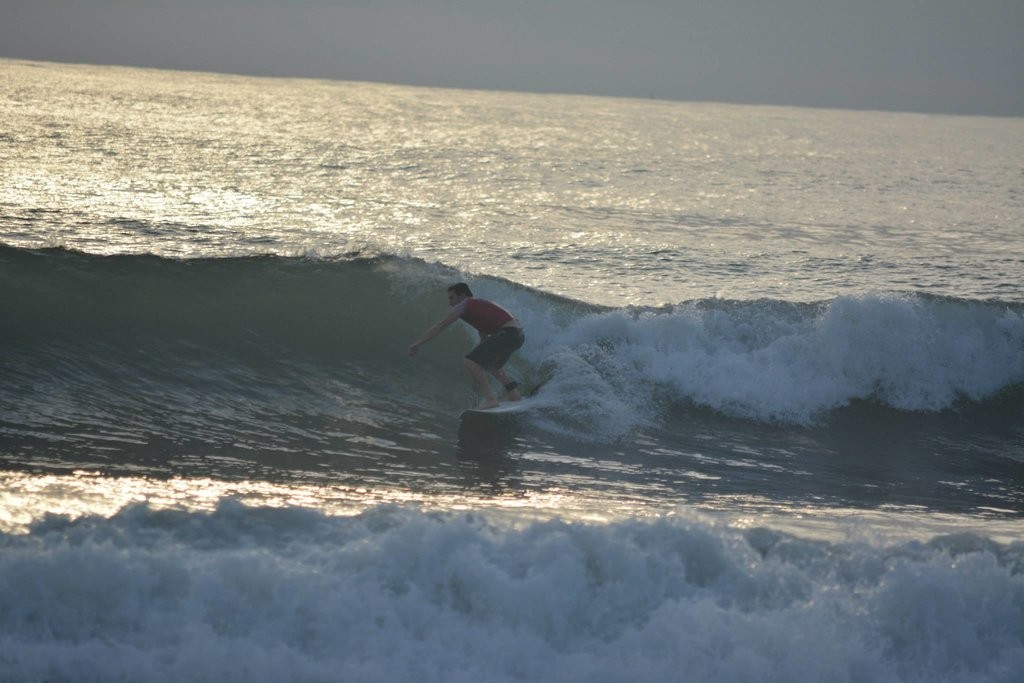 Surfing at Playa Jaco