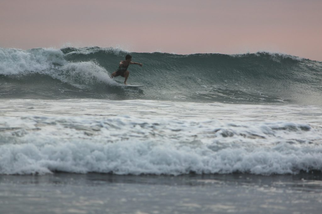 Catching a sunset wave at Room2Board