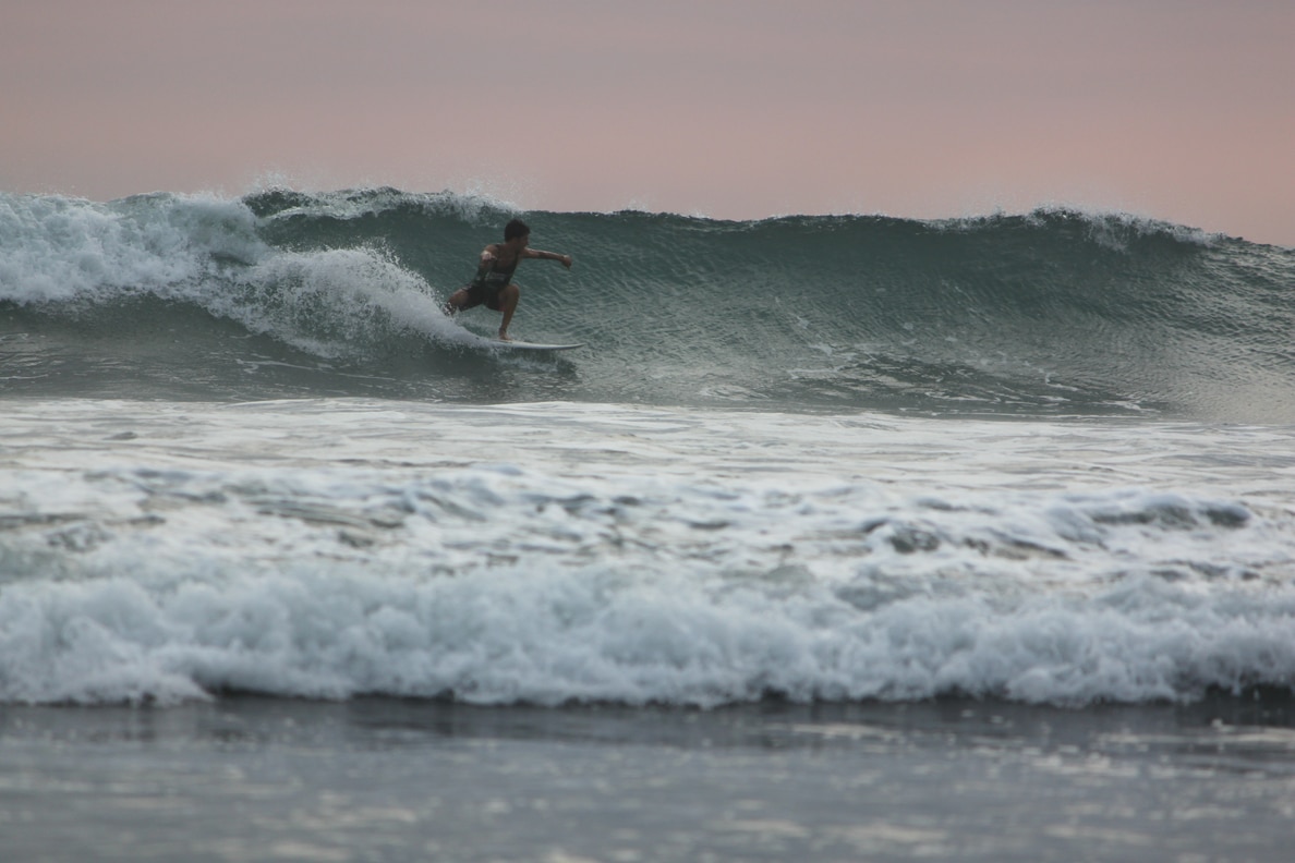 Catching a sunset wave at Room2Board