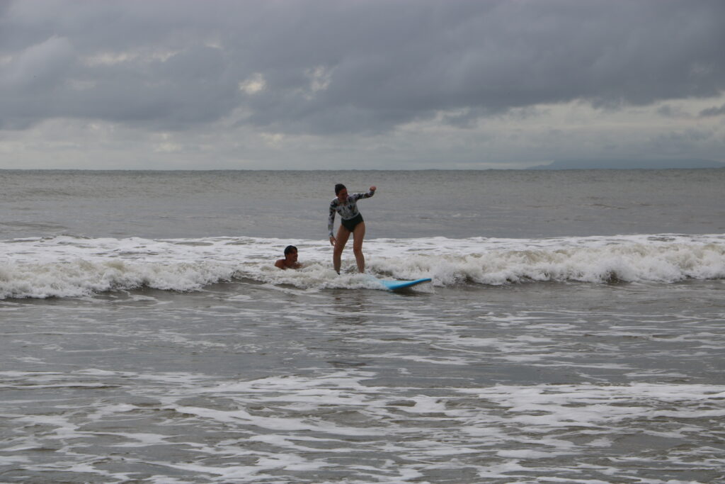 Learning to surf at Room2Board Surf Camp